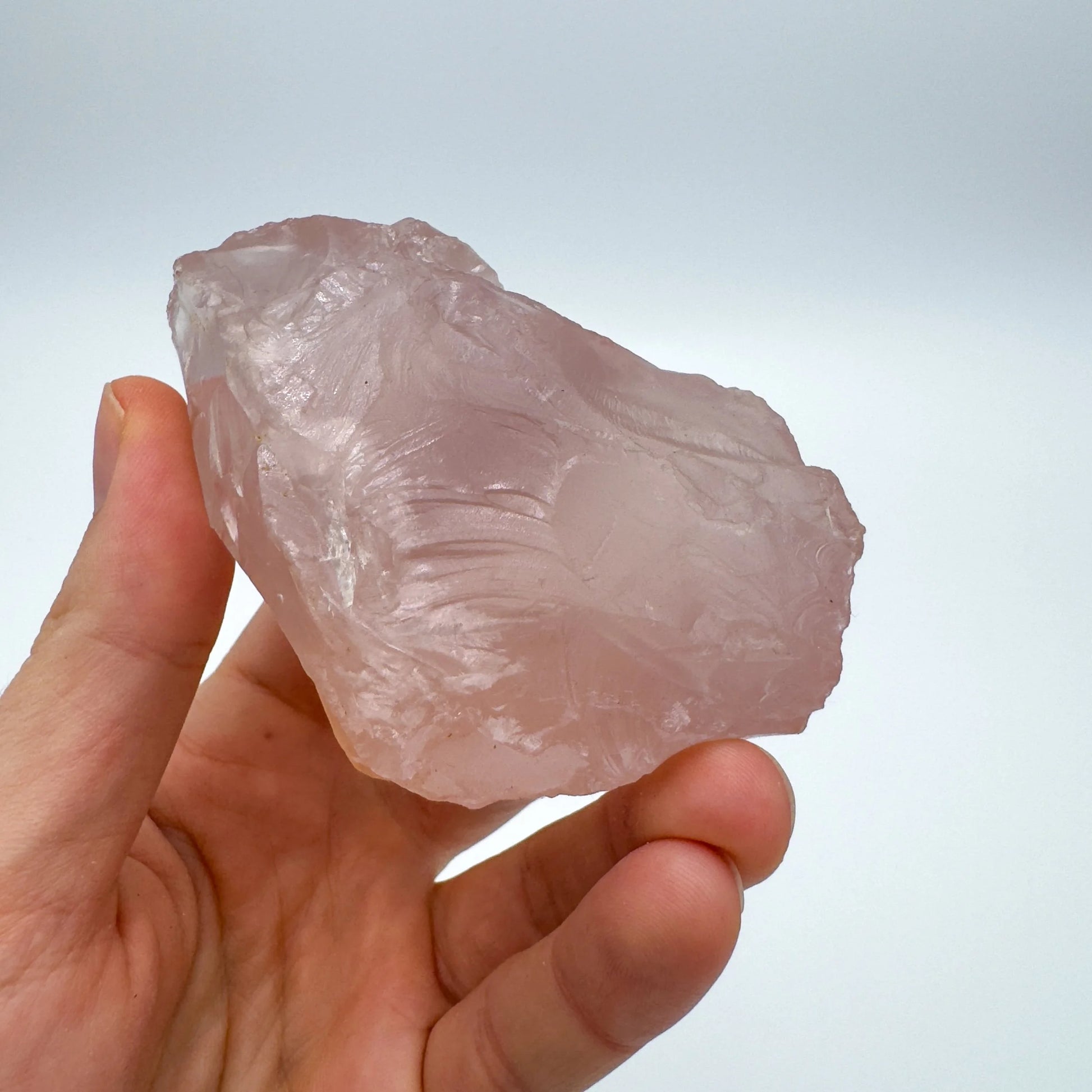 Detail shot of Grade AAA Rose Quartz specimen under natural light