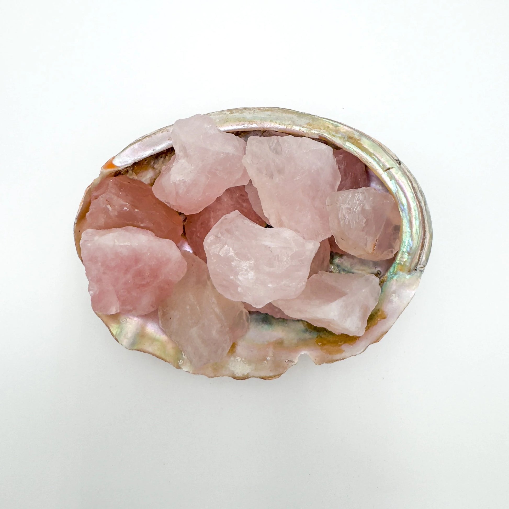 Detail of Rose Quartz raw stone, showing natural color depth, for Love.