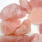 Underside detail of Grade AA Rose Quartz raw stone, Namibia-sourced, kept near for Love.