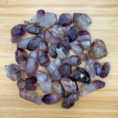 Ethically sourced Grade A Smoky Amethyst point from Masvingo, Zimbabwe at Beyond Bohemian