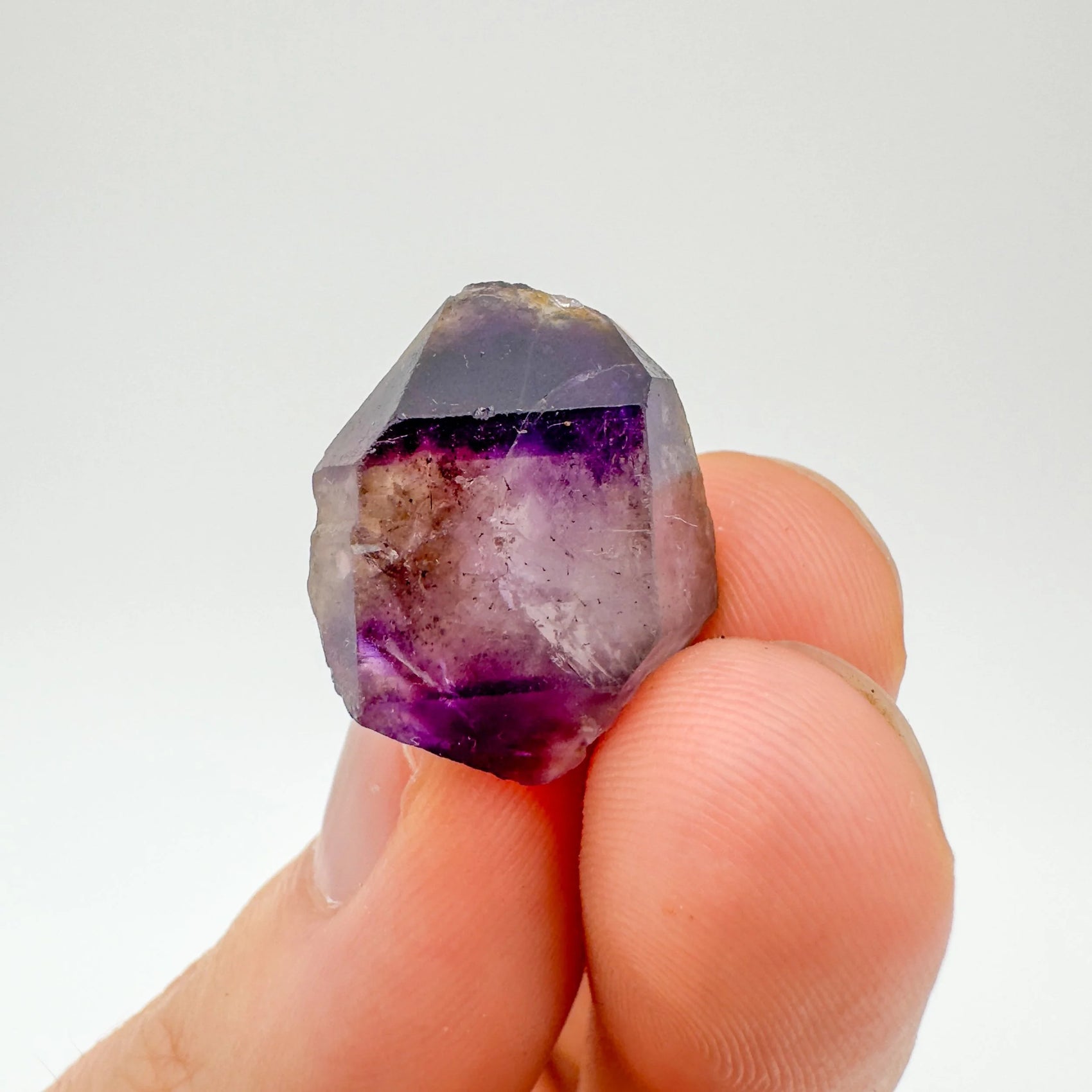 Smoky Amethyst raw crystal from Zimbabwe with Brown, Gray color, polished finish for mindful calm
