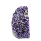 AA grade amethyst polished geode from Artigas, Uruguay, upright standing geode, dark purple crystal with a pale calcite inclusion set into the face, 4.60 x 5.25 x 8.30 in, 9.98 pounds.