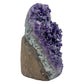 AA grade amethyst geode from Uruguay, alternate angle, a tan-brown base with green banding, specimen 50.