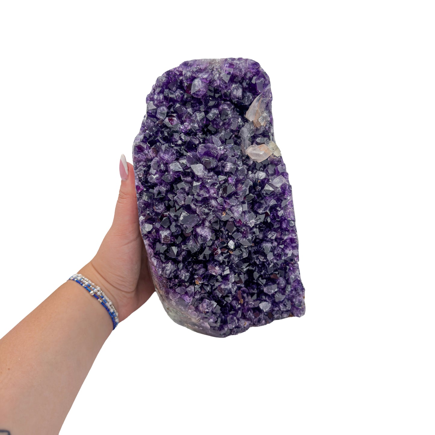 Amethyst polished geode from Uruguay held in an open hand, showing true scale, 9.98 pound upright standing geode, specimen 50.