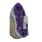 AA grade amethyst geode from Uruguay, left profile, a grey and tan agate shell, specimen 53.