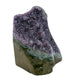 AA grade amethyst geode from Uruguay, left profile, a thick olive-brown basalt base with teal celadonite banding, specimen 41.