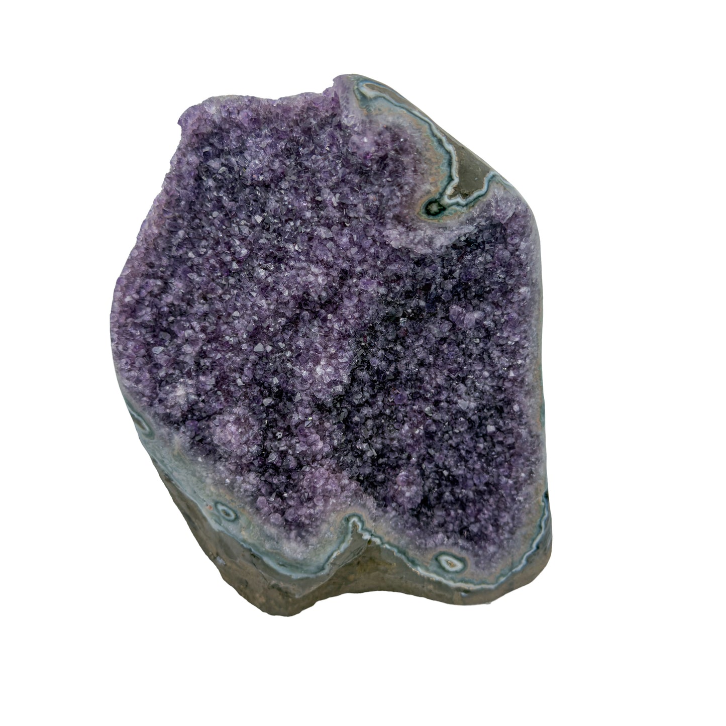 AA grade amethyst geode from Uruguay, alternate angle, a thick olive-brown basalt base with teal celadonite banding, specimen 41.