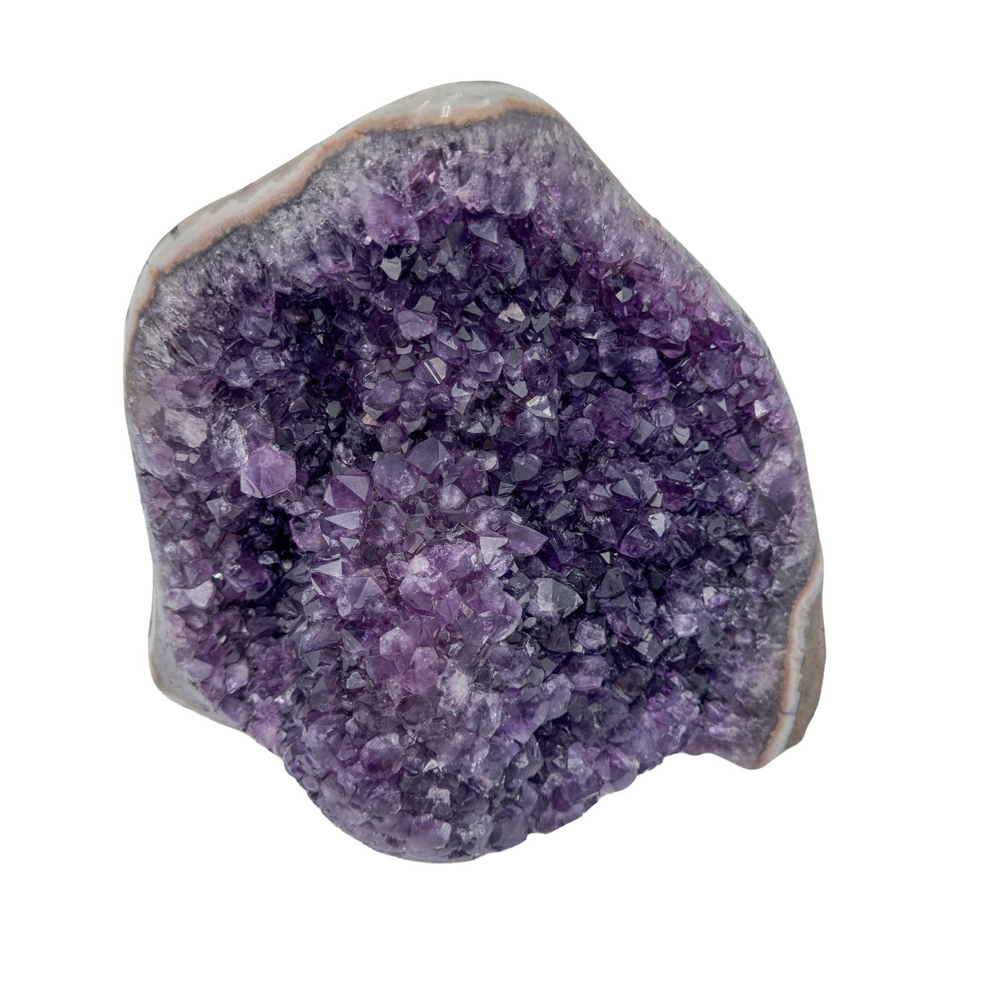 AA grade amethyst geode from Uruguay, angled three-quarter view, a thick pale grey agate rim, specimen 55.