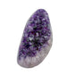 AAA grade amethyst geode from Uruguay, angled three-quarter view, white and grey agate banding at the base, specimen 12.
