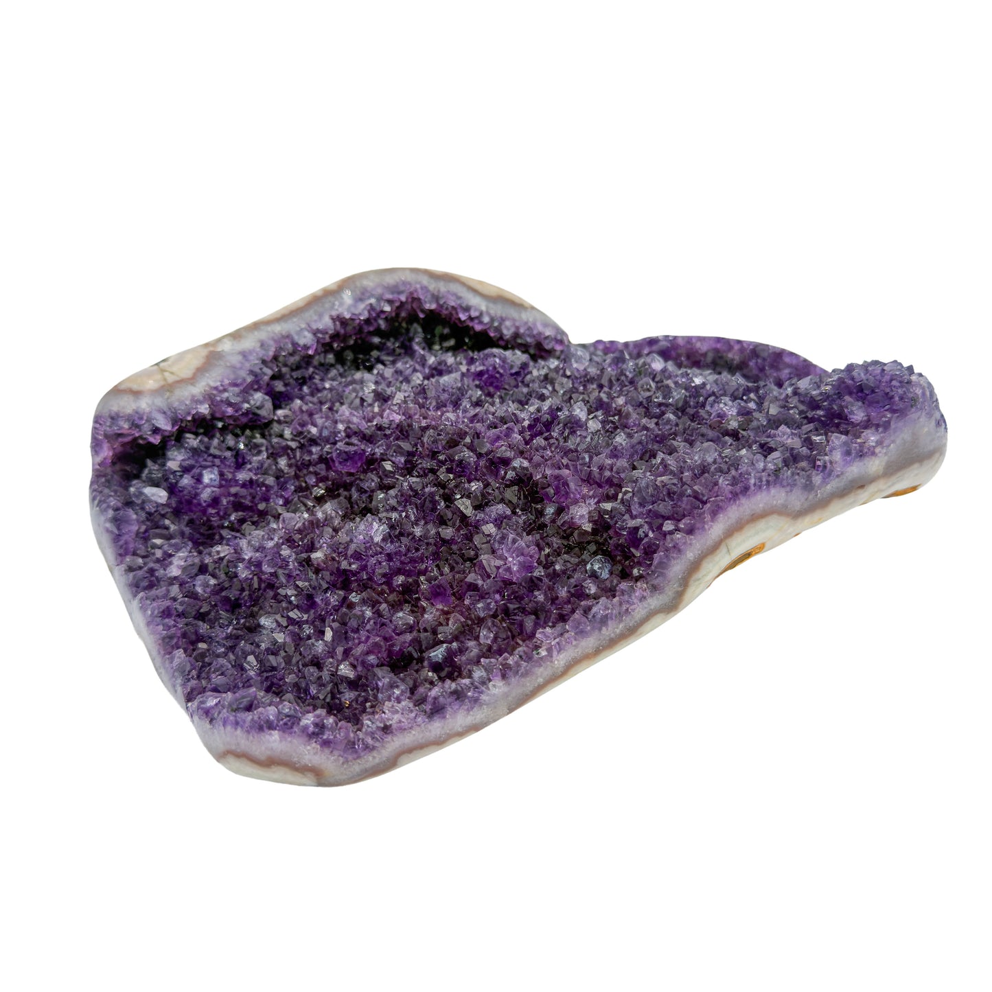 AA grade amethyst geode from Uruguay, right profile, a cream and tan agate rim, specimen 23.