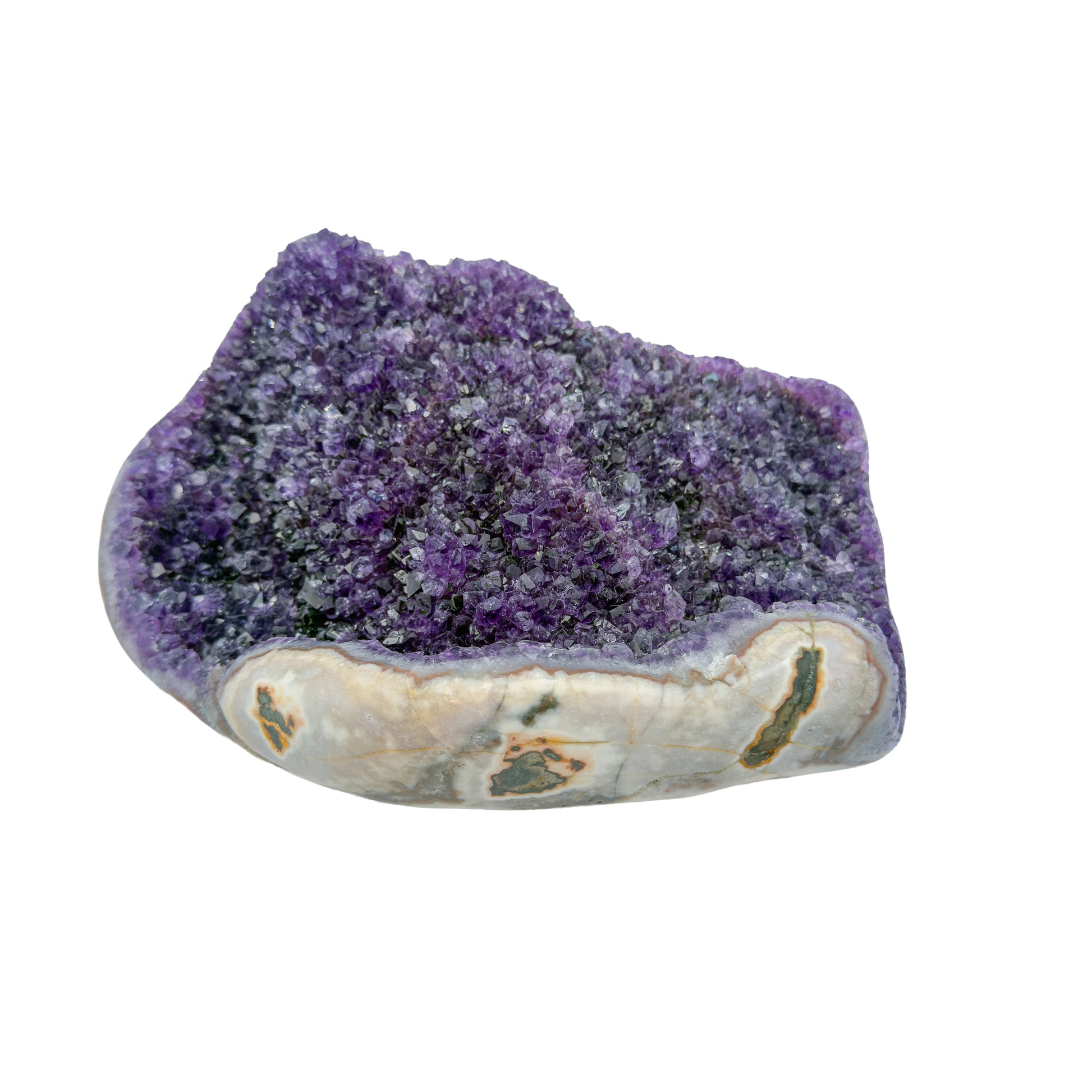 AA grade amethyst geode from Uruguay, detail of the crystal face, a cream and tan agate rim, specimen 23.