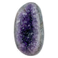 AAA grade amethyst polished geode from Artigas, Uruguay, closed almond-shaped nodule, dark purple crystals visible through a narrow slit opening, 7.80 x 4.87 x 3.20 in, 5.39 pounds.