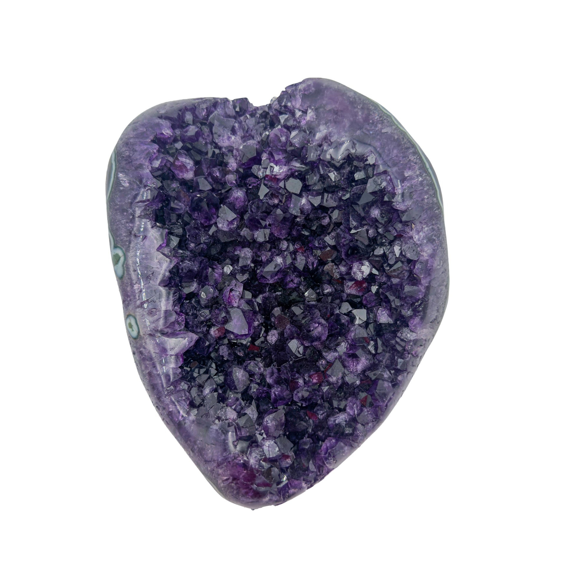 AAA grade amethyst geode from Uruguay, detail of the crystal face, pale green celadonite banding over a yellow-olive base, specimen 24.