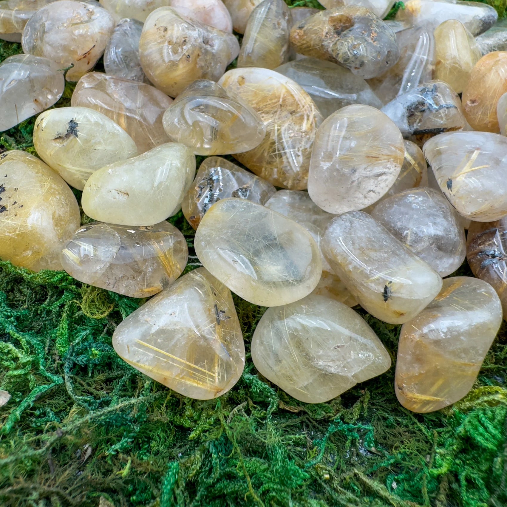 Detail shot showing Grade AAA Quartz tumbled stone, often kept for Cleansing and Meditation, showing natural variation.