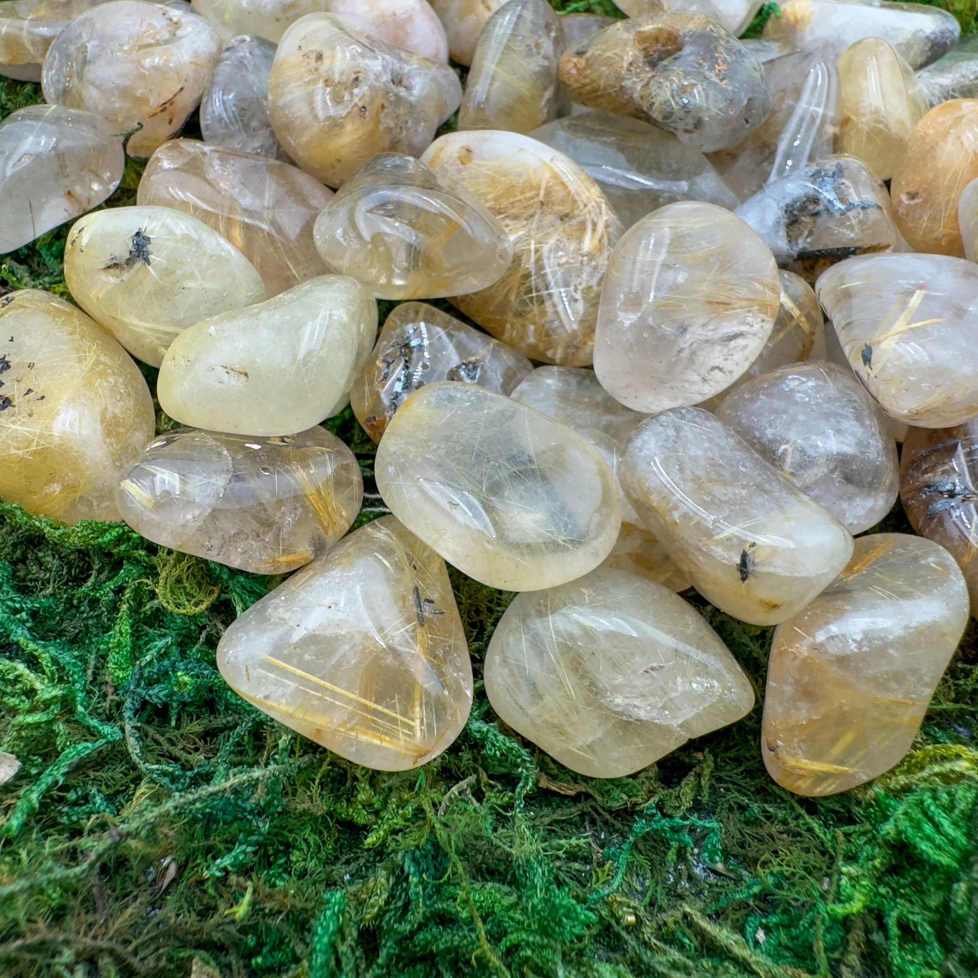 Detail shot showing Grade AAA Quartz tumbled stone, often kept for Cleansing and Meditation, showing natural variation.