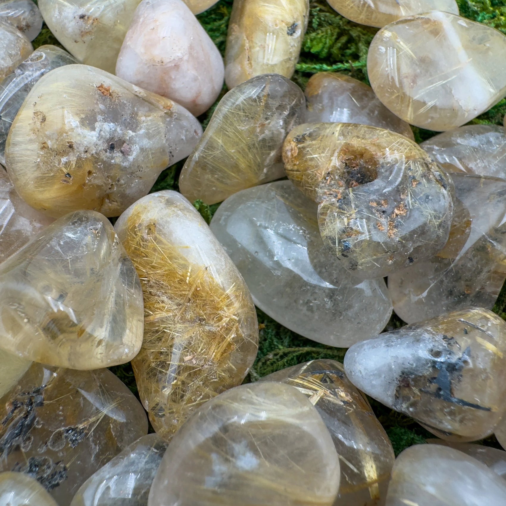 Underside detail of Quartz tumbled stone, showing matte finish, from Minas Gerais, Brazil.