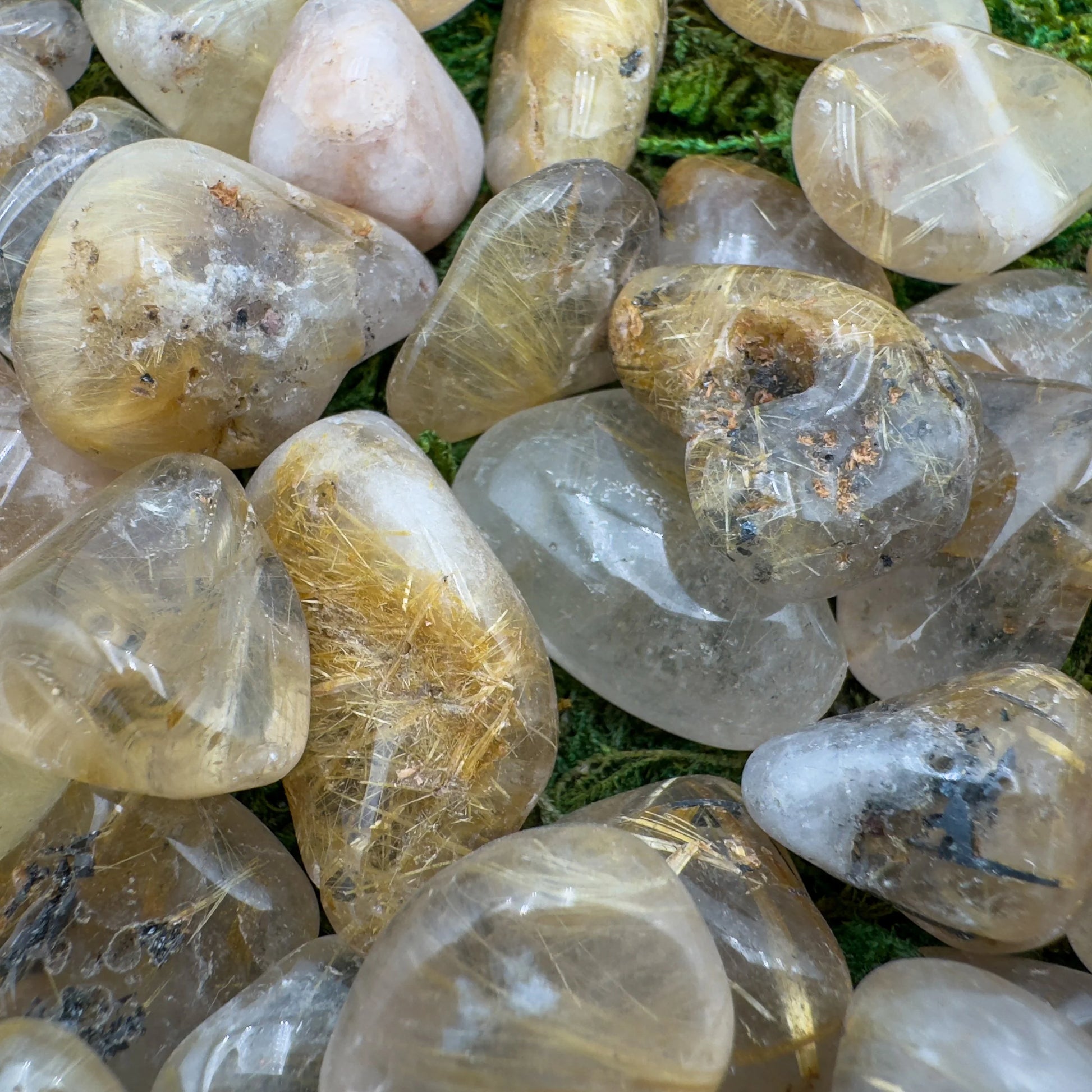 Underside detail of Quartz tumbled stone, showing matte finish, from Minas Gerais, Brazil.