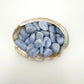 Detail shot showing Blue Lace Agate tumbled stone, for Stress Relief, showing earthy tone.
