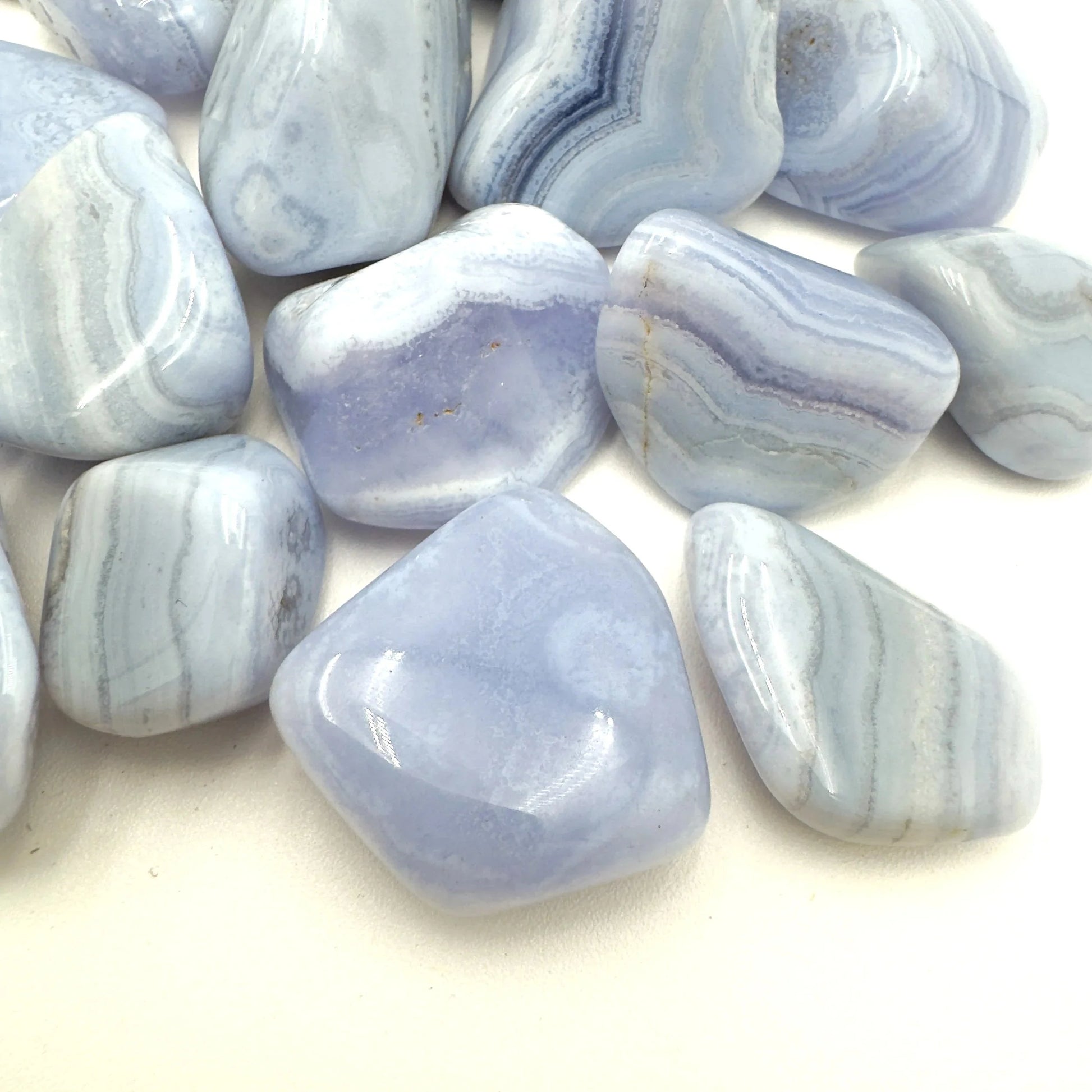 Reverse angle of Blue Lace Agate tumbled stone, turned to for Stress Relief, from ǁKaras Region, Namibia.