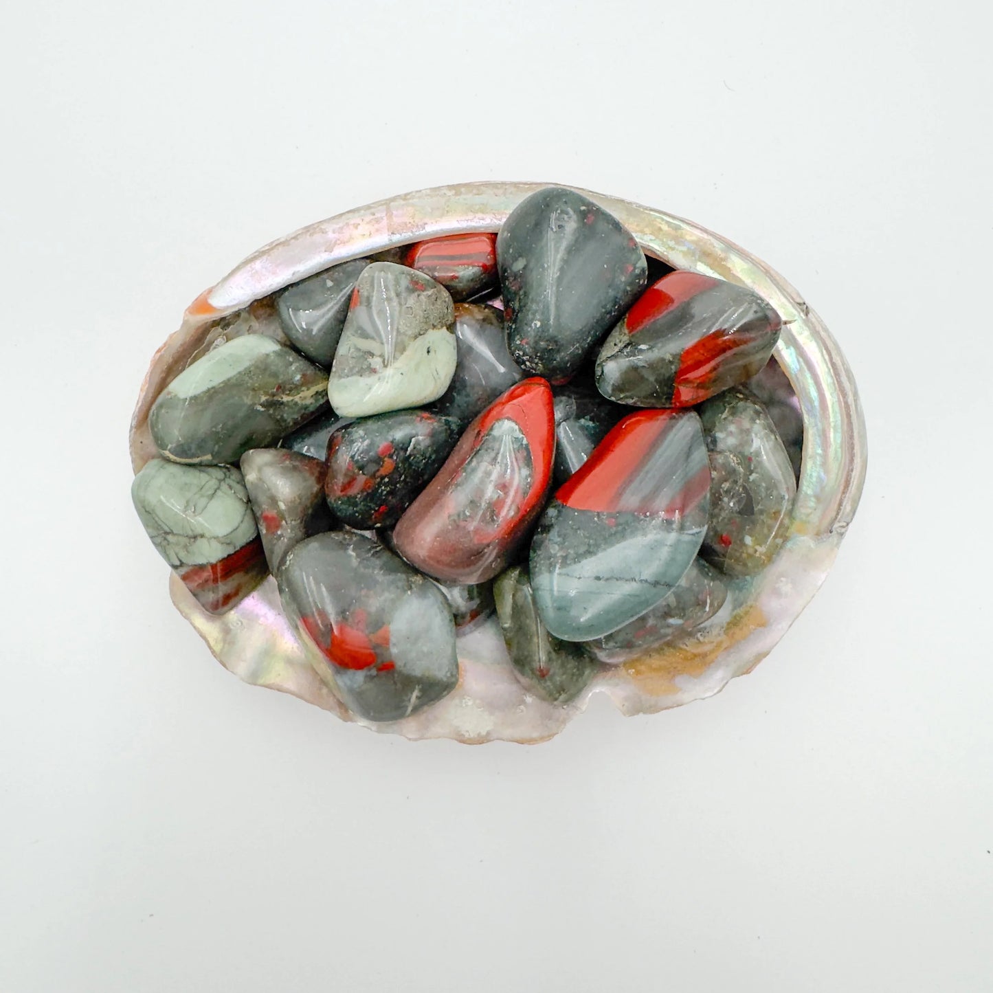 Detail of Grade AA Bloodstone tumbled stone, carried for Energy and Protection.