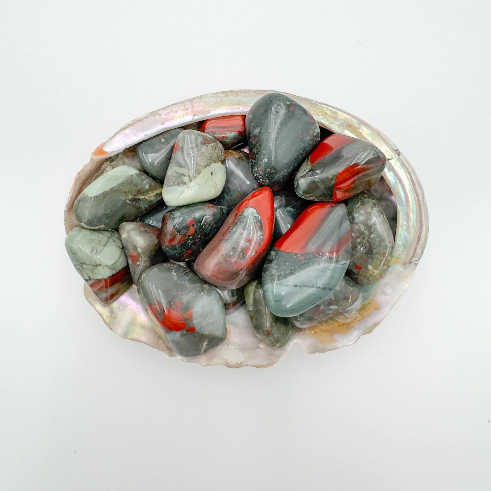 Detail of Grade AA Bloodstone tumbled stone, carried for Energy and Protection.