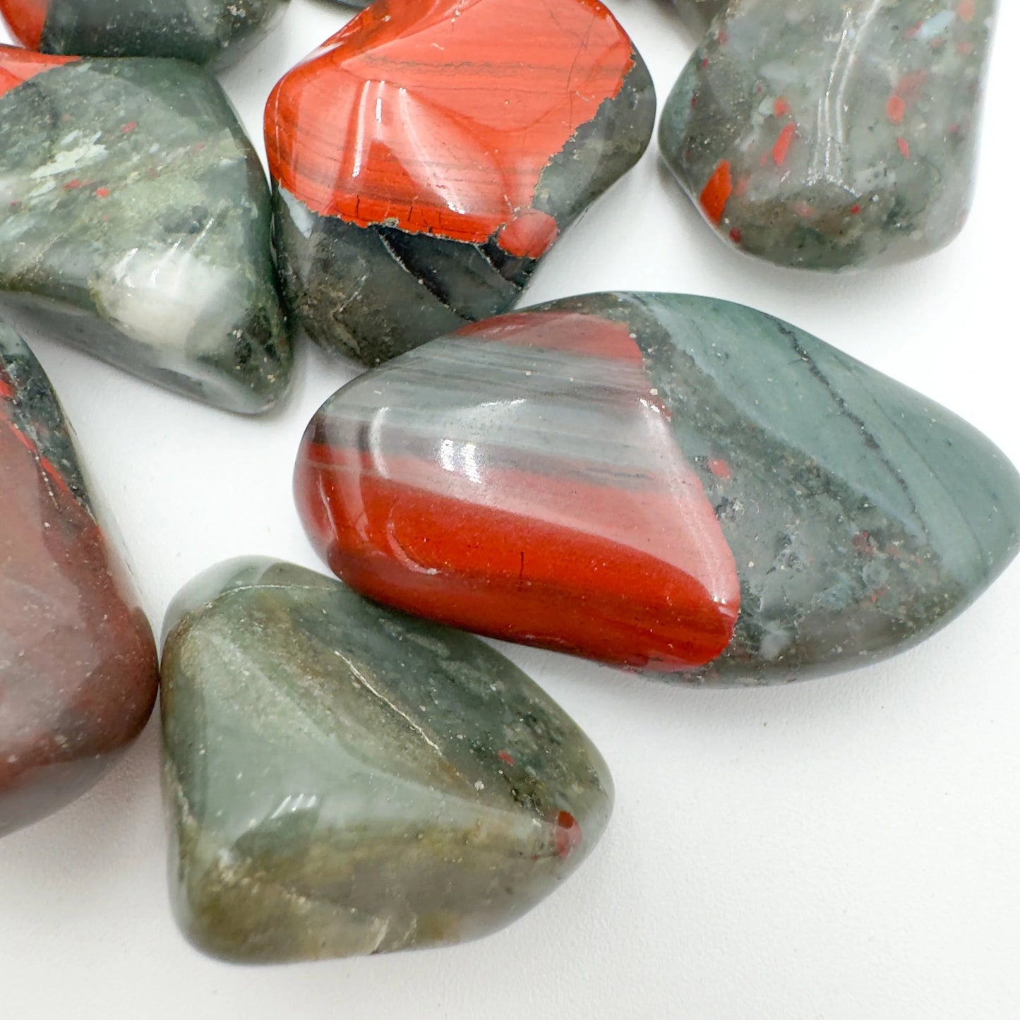 Looking down on Bloodstone tumbled stone, showing characteristic patterning, Eswatini-sourced.