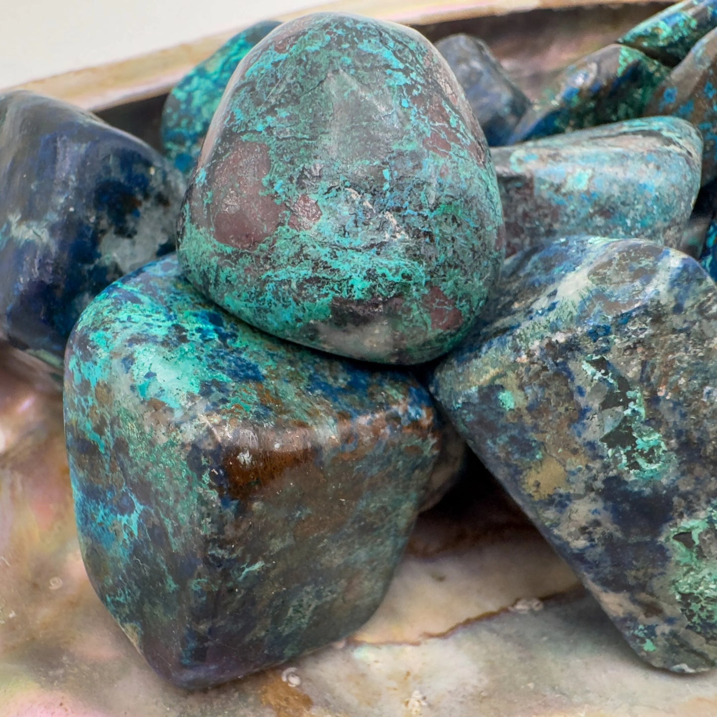 Profile shot of Grade AA Azurite tumbled stone, showing characteristic finish.