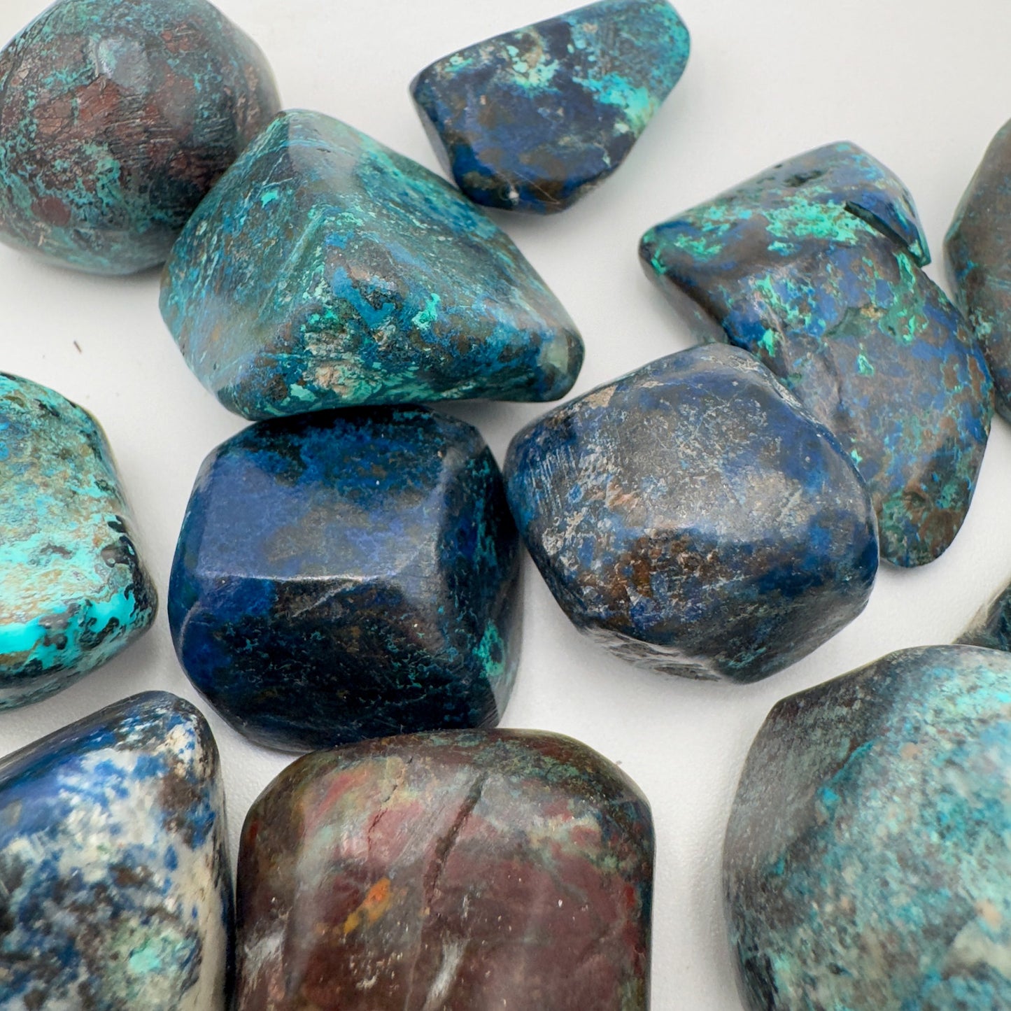 Close-up of Azurite tumbled stone, showing earthy tone, sourced from Kunene, Namibia.