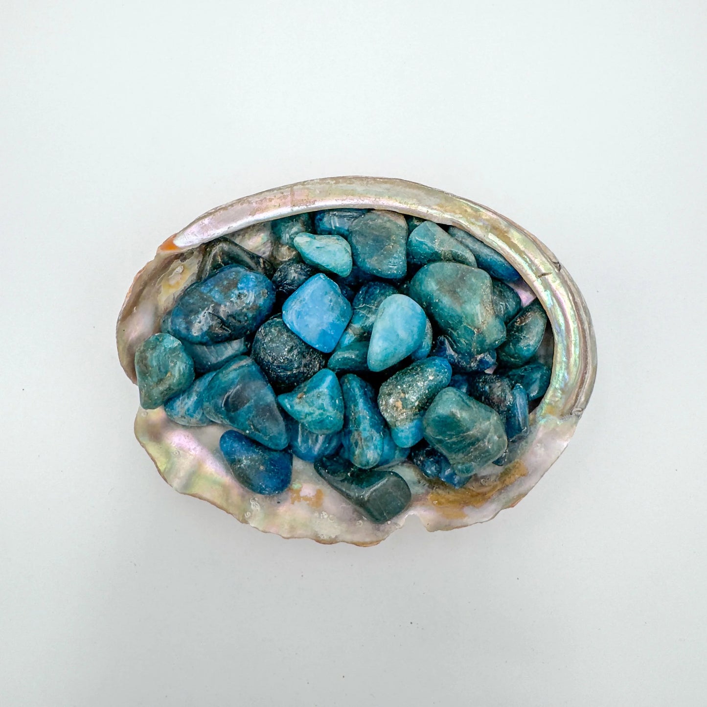 Detail capture of Apatite tumbled stone, showing natural inclusions, Madagascar-sourced.