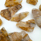 Plan view of Golden Healer raw stone, worked with for Healing, showing tight grain.