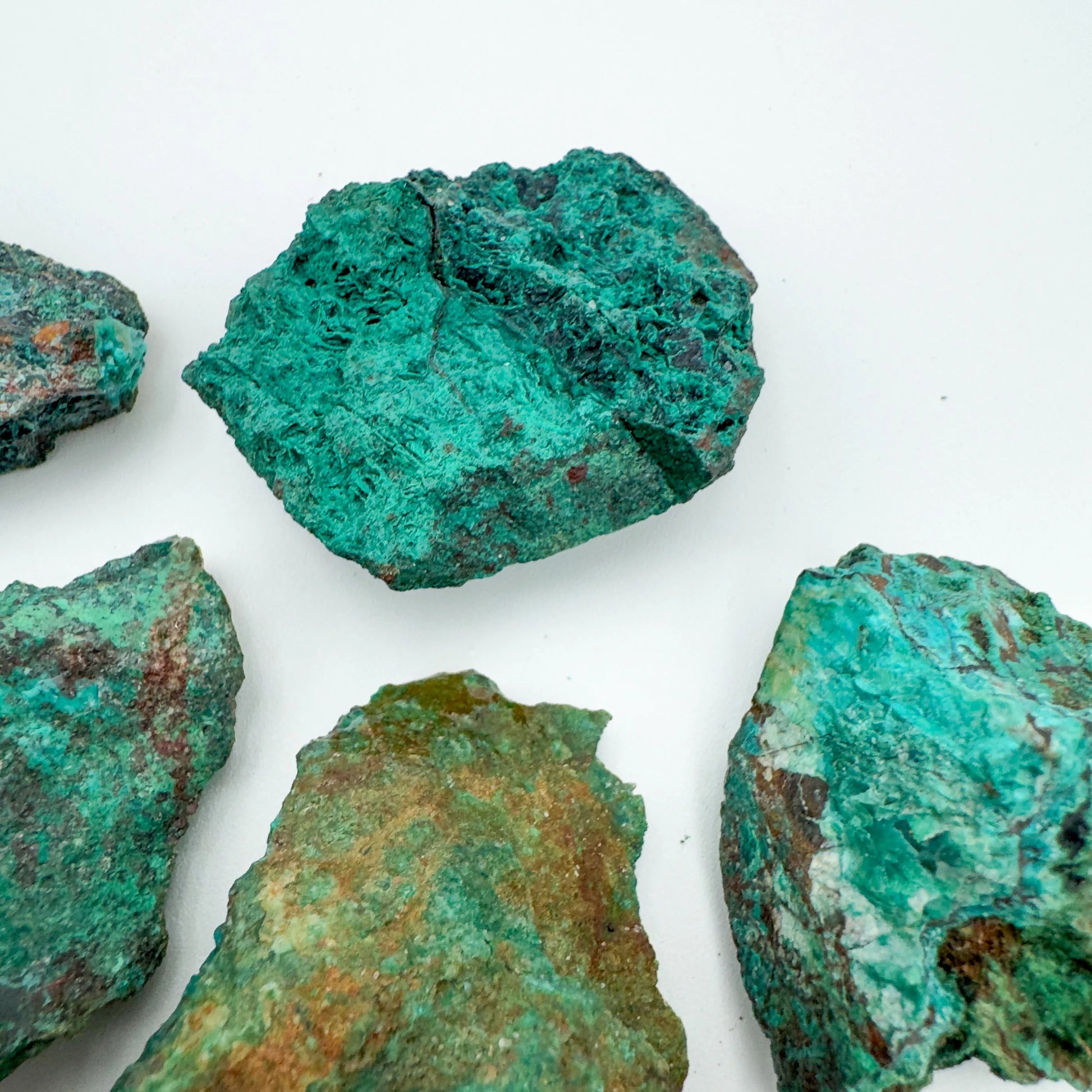 Rear view of Chrysocolla raw stone, Namibia-sourced, showing natural patina.