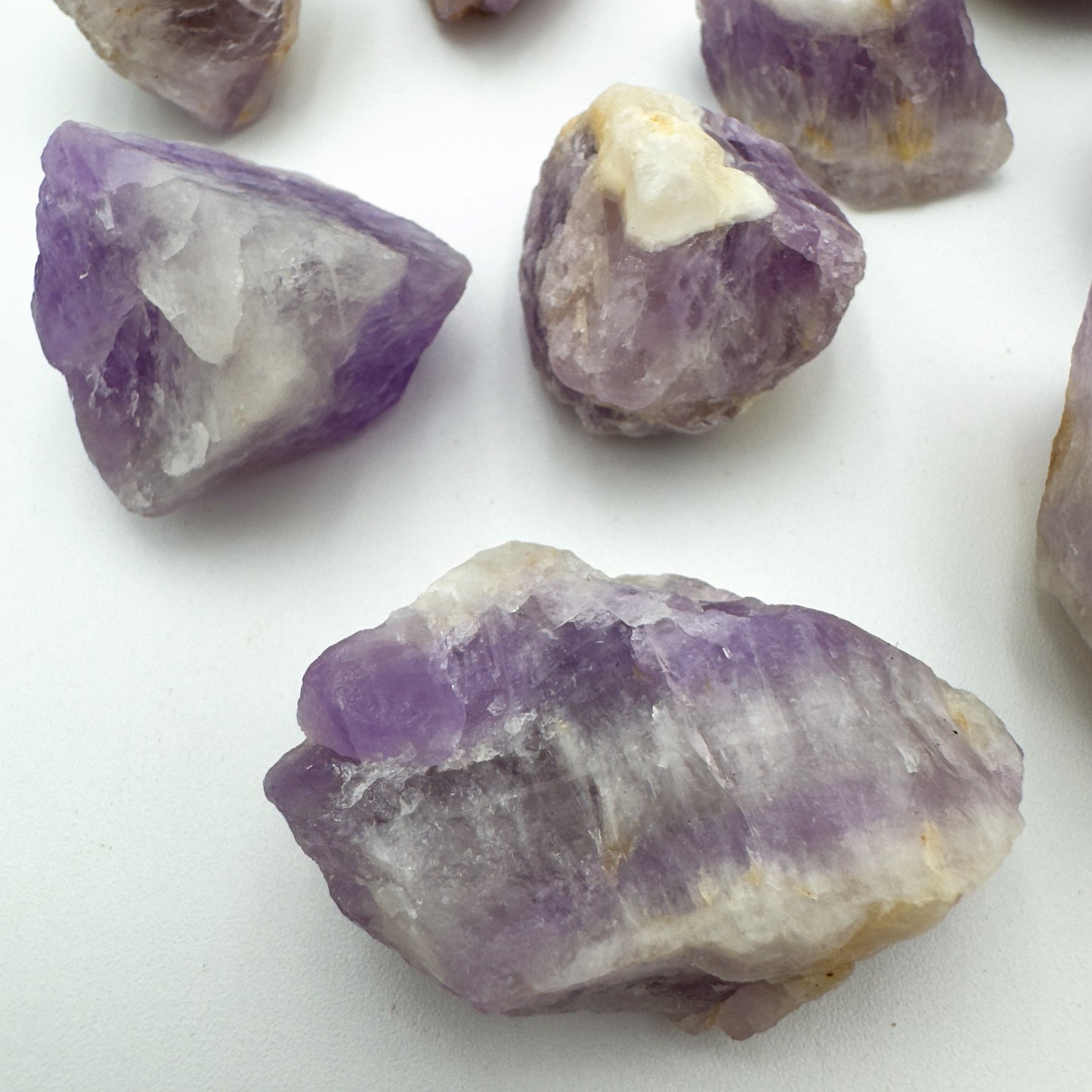 Side perspective of Amethyst raw stone, showing natural patina.