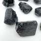 Plan view of Black Tourmaline raw stone, sourced from Vakinankaratra, Madagascar, kept close for Protection.