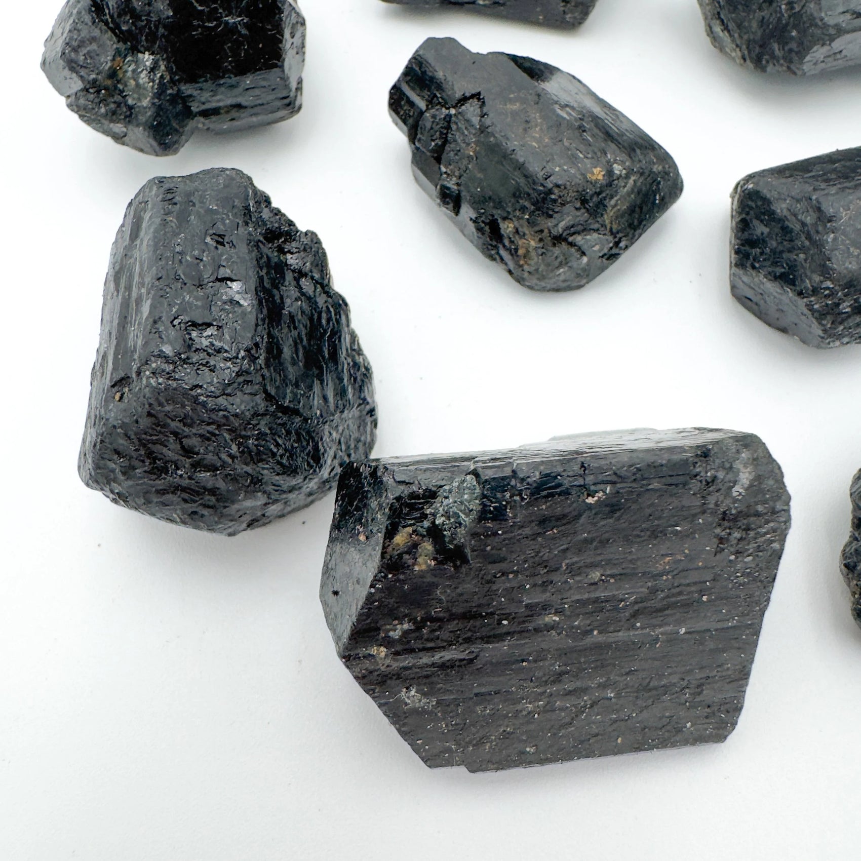 Plan view of Black Tourmaline raw stone, sourced from Vakinankaratra, Madagascar, kept close for Protection.
