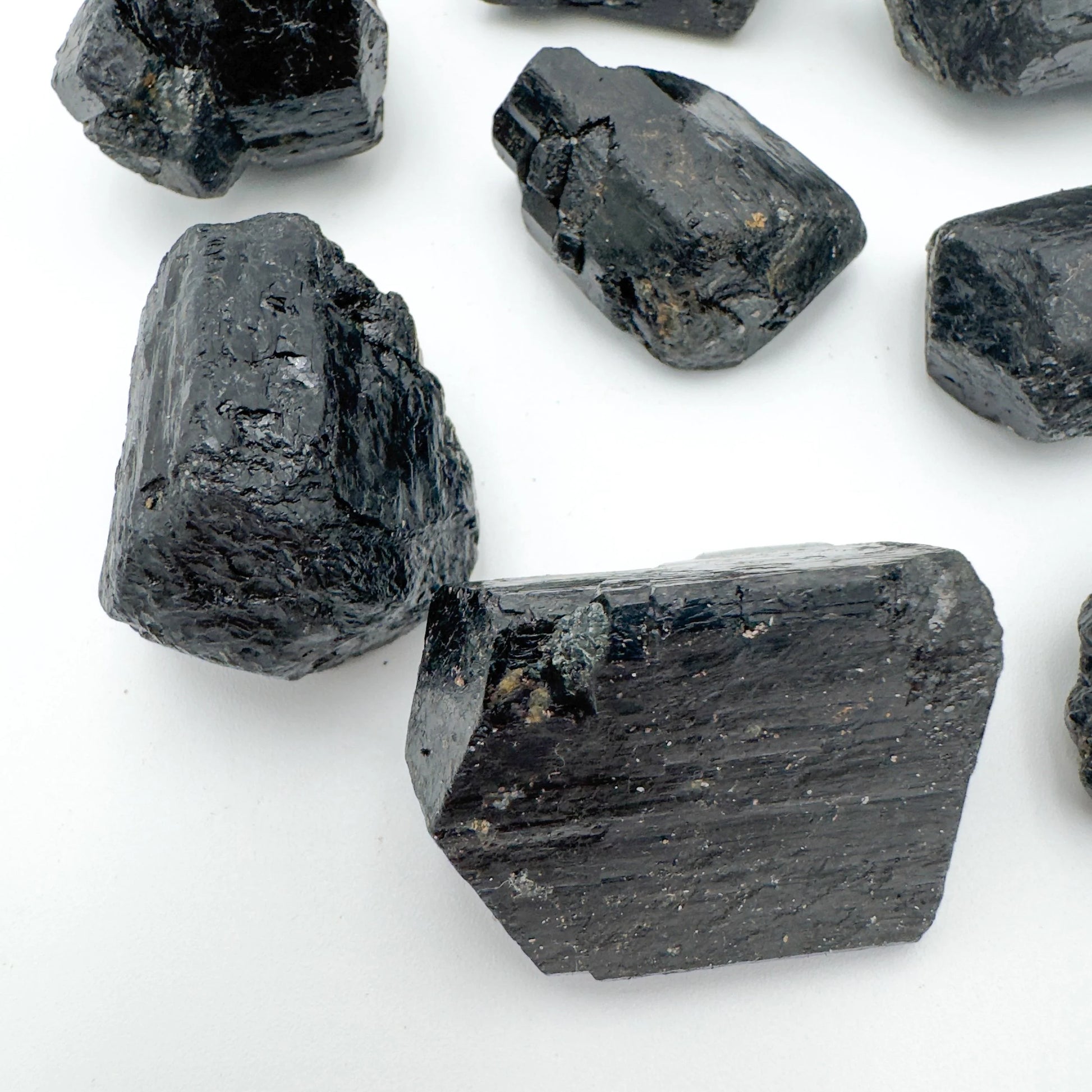 Plan view of Black Tourmaline raw stone, sourced from Vakinankaratra, Madagascar, kept close for Protection.