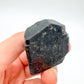 Back view of Grade AA Black Tourmaline raw showing natural surface