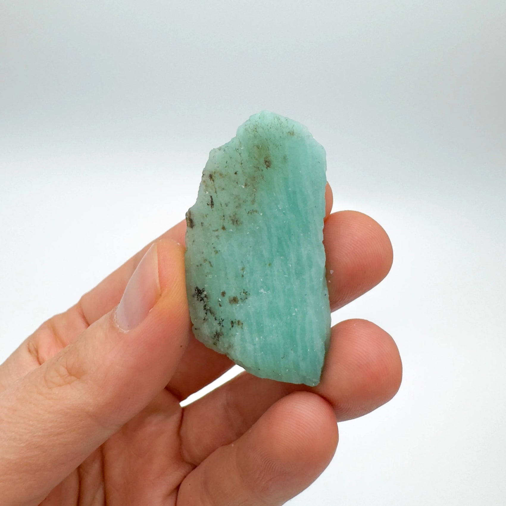 Close-up of Amazonite raw stone from Mozambique, soothing wellness stone for Emotional Healing