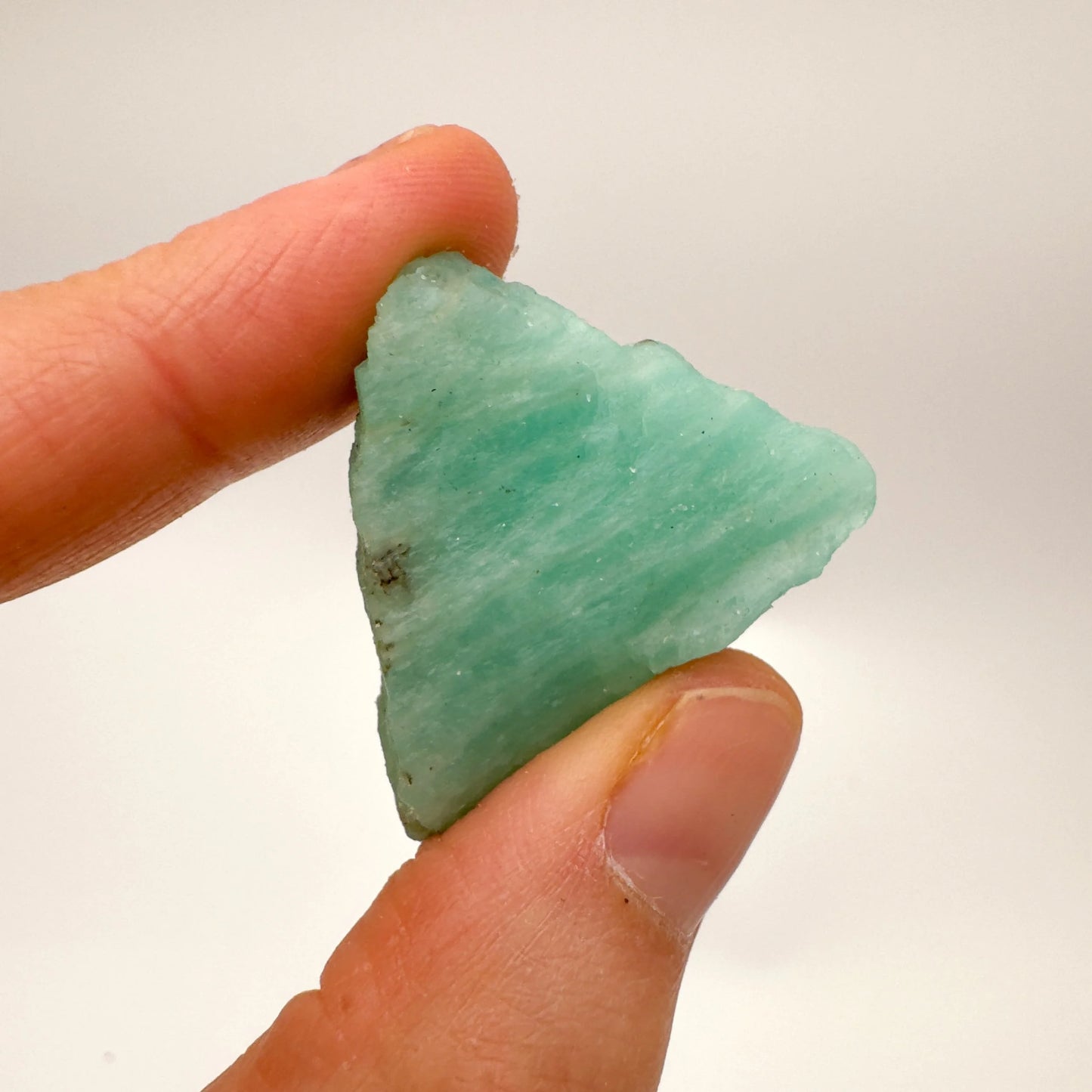 Detail shot of Grade A Amazonite raw under natural light