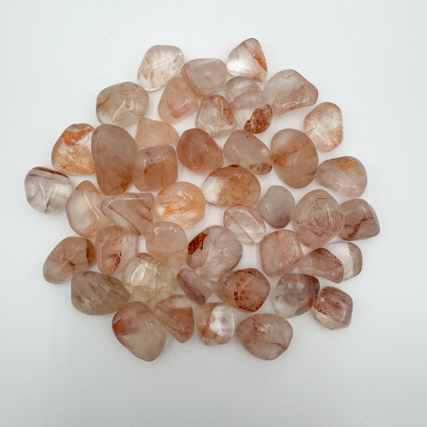 Texture-level view of Fire Quartz tumbled stone, from Madagascar.