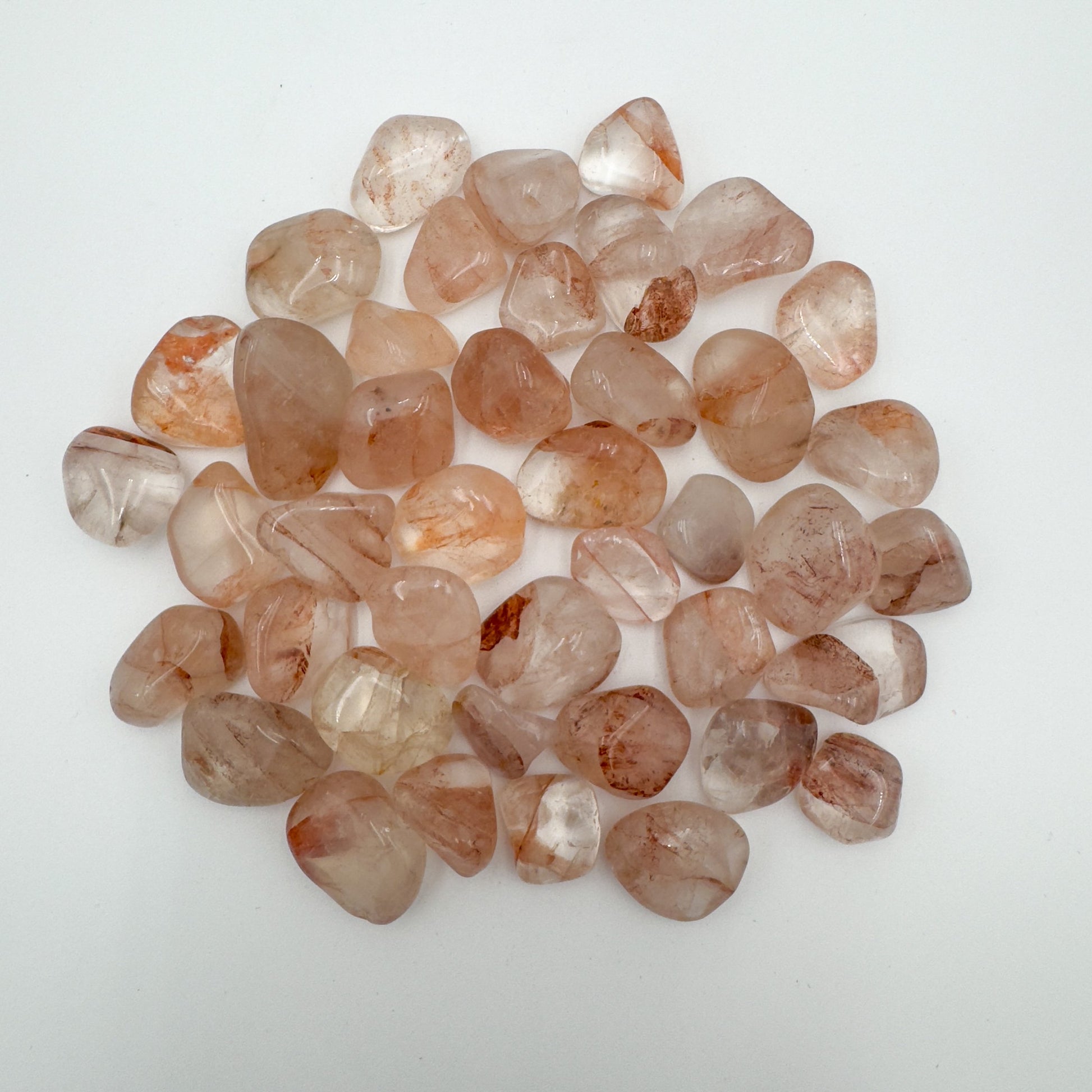 Texture-level view of Fire Quartz tumbled stone, from Madagascar.