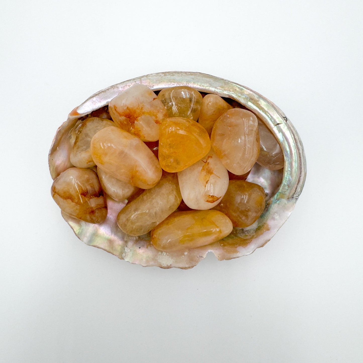 Grain detail of Grade AA Golden Healer tumbled stone, showing natural variation.