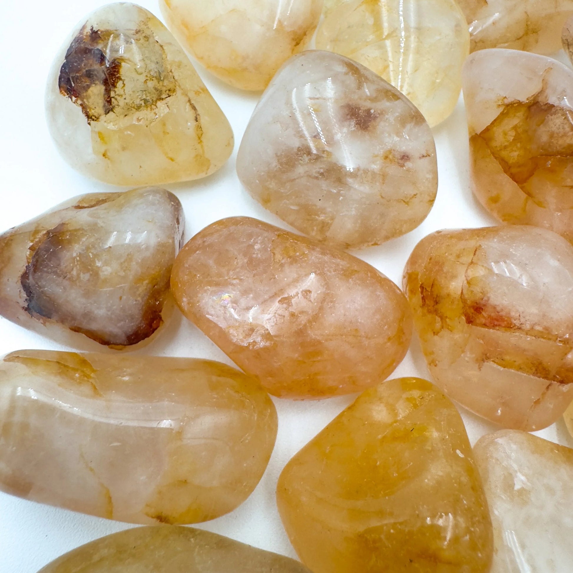 Aerial view of yellow Golden Healer tumbled stone, often paired with practices around Healing, showing characteristic color.
