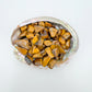 Detail capture of Grade A Tiger Eye tumbled stone, traditionally used for Confidence and Career, South Africa-sourced.