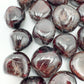 Underside view of Garnet tumbled stone, sourced from Malawi, to support Energy and Confidence.