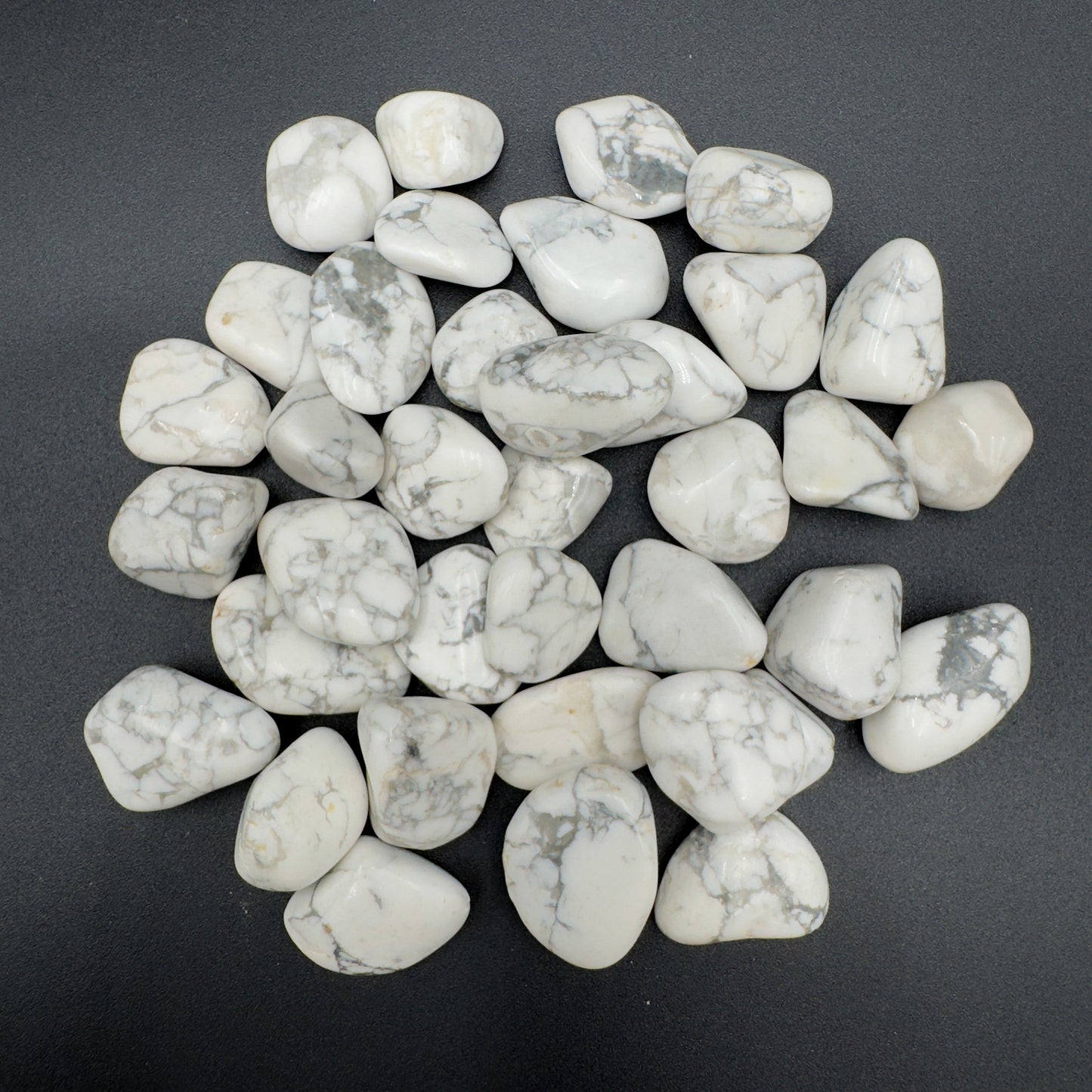 Close-up of Howlite tumbled stone from Zimbabwe, soothing wellness stone for Meditation