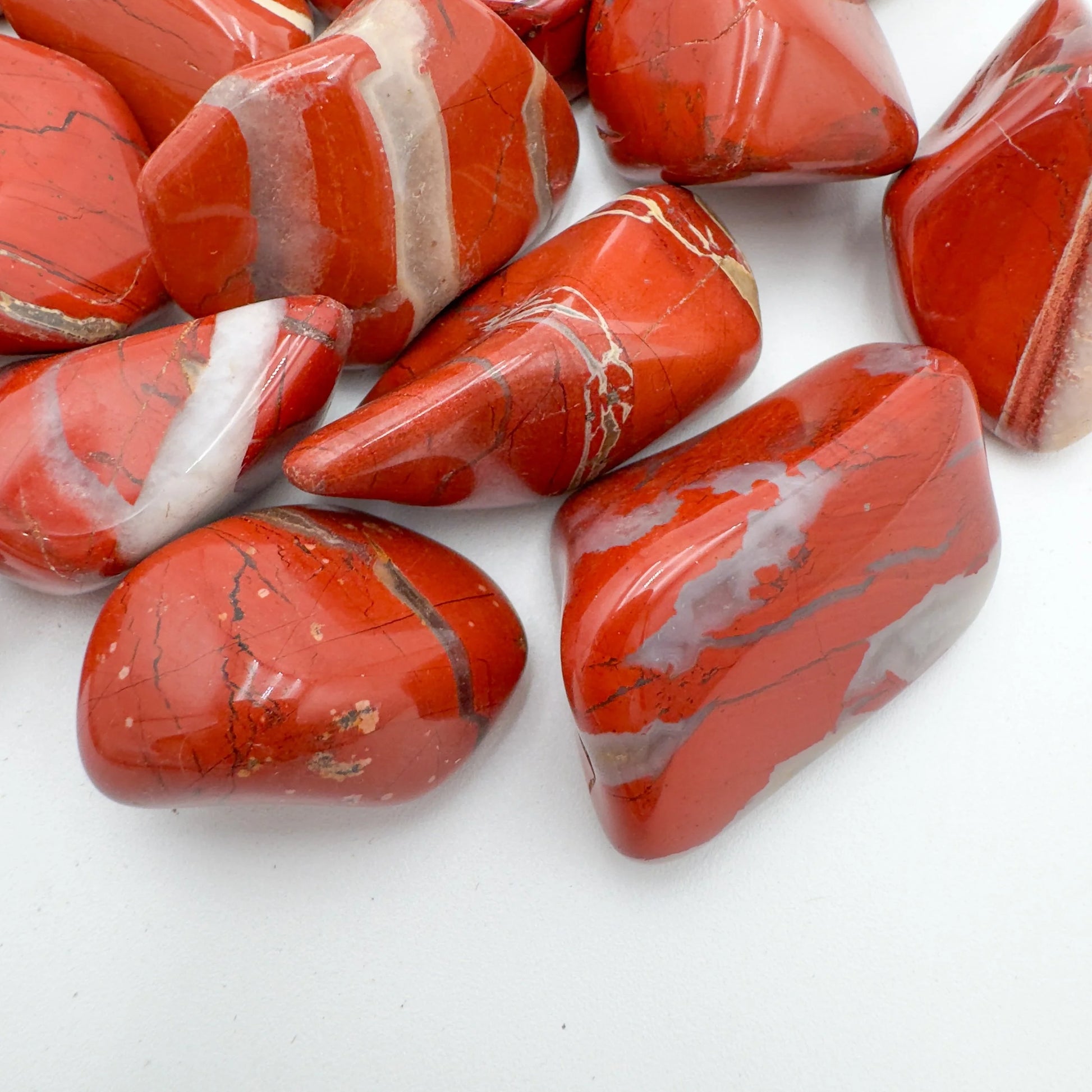 Red Jasper tumbled stone from South Africa with Red color, polished finish for mindful calm