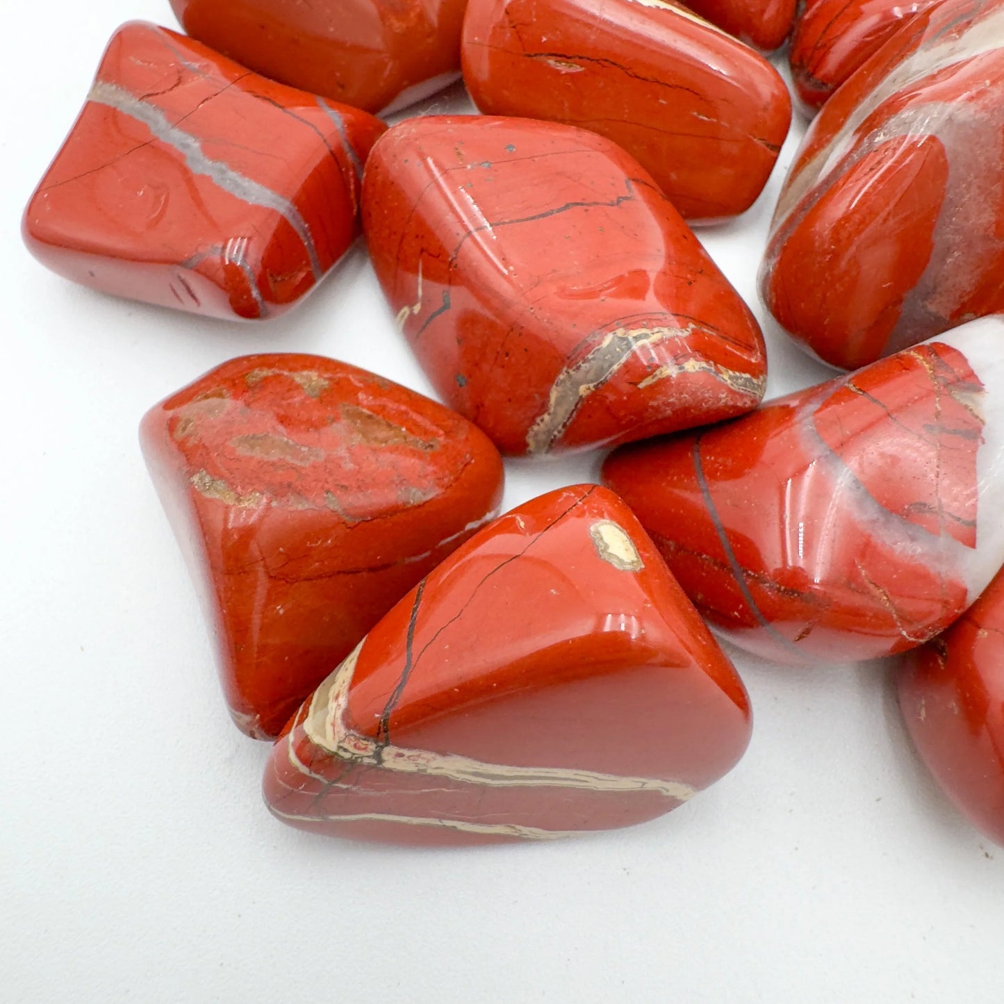 Handheld Red Jasper tumbled stone from South Africa for meditation, Confidence and Protection