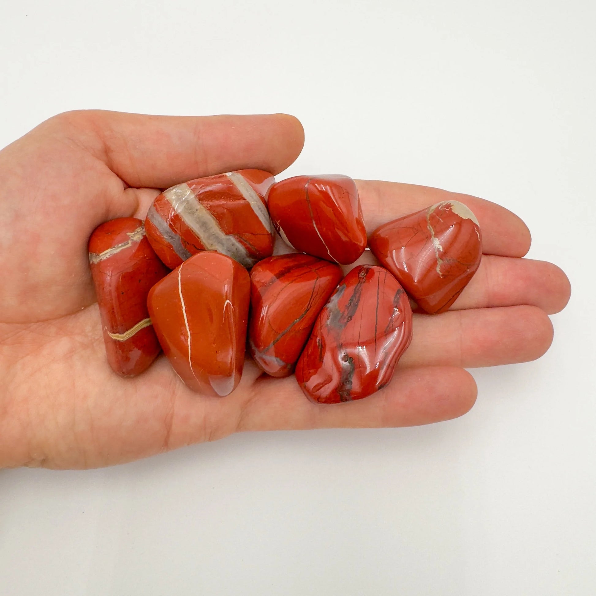 Red Jasper tumbled stone from South Africa with Red color, polished finish for mindful calm