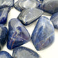 Bird's-eye view of Sodalite tumbled stone, showing translucent edges, from Kunene, Namibia.