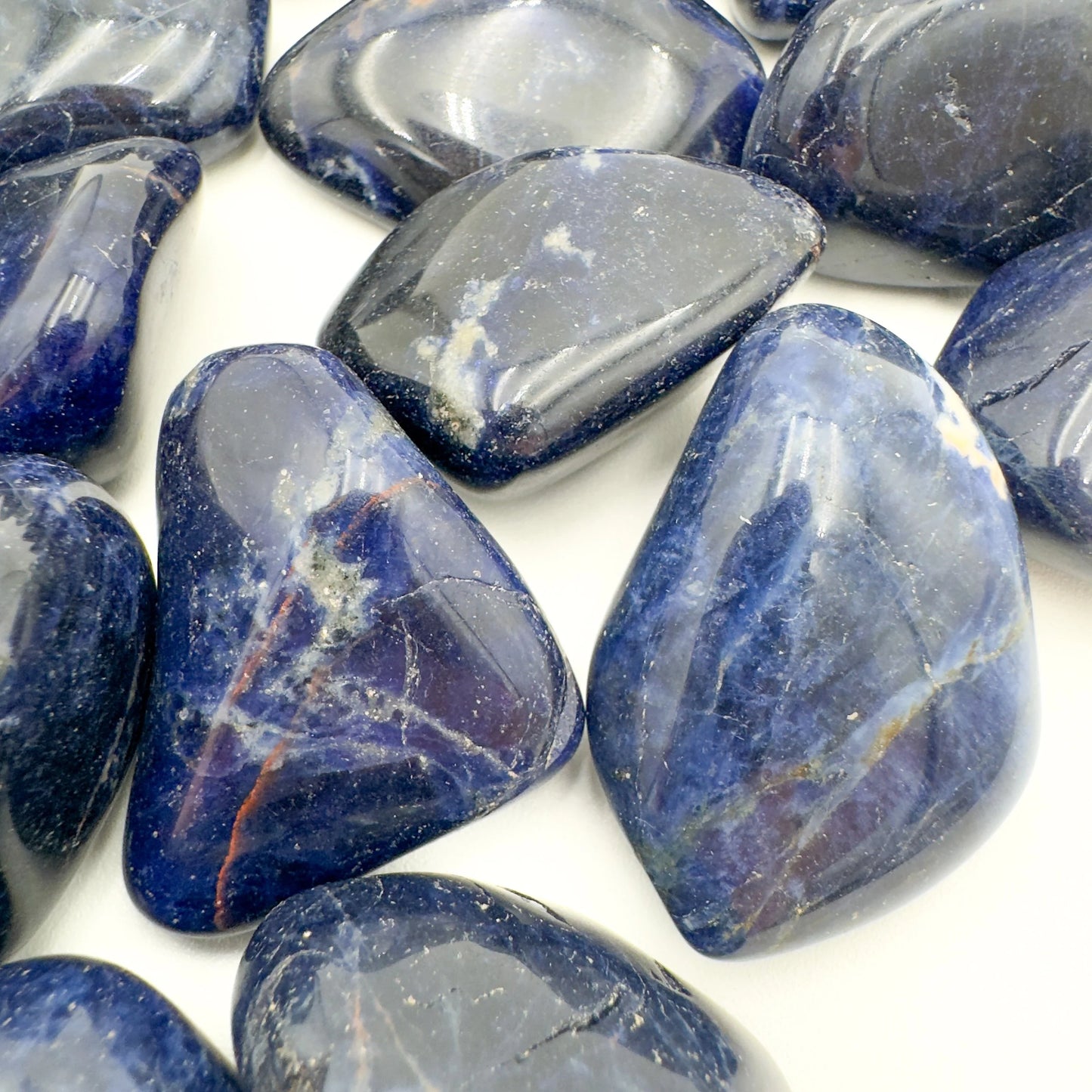 Bird's-eye view of Sodalite tumbled stone, showing translucent edges, from Kunene, Namibia.
